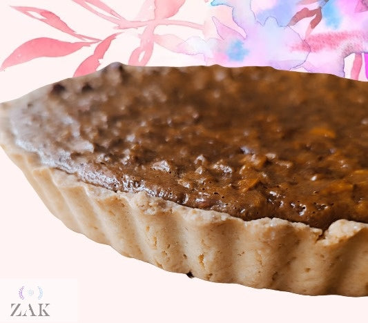 Tart de dulce de leche y nueces Embárcate en una travesía de serenidad con nuestra Tarta de Dulce de Leche y Nueces, una fusión armoniosa de indulgencia consciente. Cada rebanada es una meditación Tart de dulce de leche